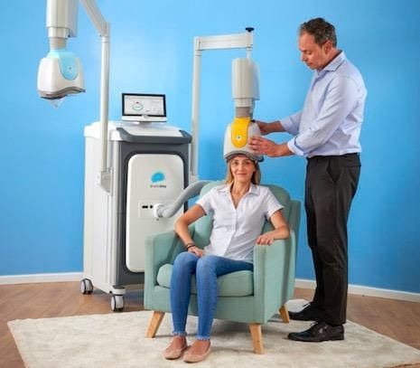 A female patient receiving BrainsWay OCD Deep TMS treatment